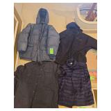 Assorted mens winter wear. 1 Eddie Bauer  jacket, 1 patagonia jacket, 1 rugged elements jacket, and 1 weather proof vest