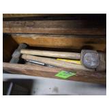 Wooden toolbox with sledge hammers