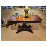 Pedestal table roughly 26 by 42 in table only