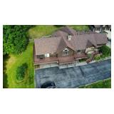 Aerial view of 32± acre property and 6,000+ square