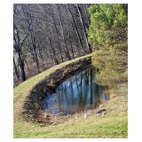 Aerial view of 32± acre property and 6,000+ square