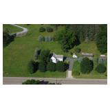 Carriage house and additional outbuilding included