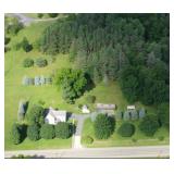 Aerial view of 32± acre property and 6,000+ square