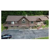 Aerial view of 32± acre property and 6,000+ square