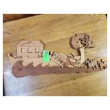 handcrafted wooden intarsia or scroll saw art piece depicting Noah