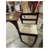 vintage school chair features a solid wood construction with an attached writing surface