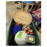 Tote full of metal tins and other miscellaneous items