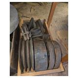 Vintage iron grinder wheels and pulleys