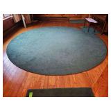 Green carpets measuring 12 feet round