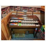 Working vintage Wurlitzer electric organ with bench