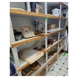 Serving trays and miscellaneous kitchen items everything on the four shelves