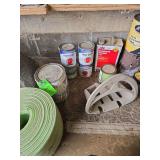 Paint hose hanger and foam