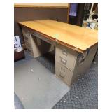 Large office desk with contents