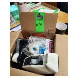 Box of tape, paperclips, note pads