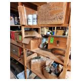 Contents of shelf. Rocks, vintage tools, mugs, bottle openers