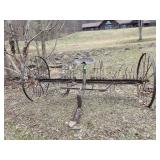 Vintage horse-drawn hay rake, commonly referred to as a "dump rake" due