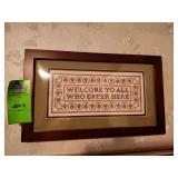 Needlepoint artwork and two religious saying