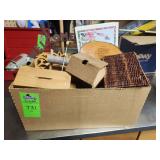 Box of wooden decor pieces