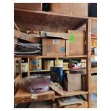 Contents of shelf. Toilet seat, car mirror wood box