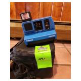 Polaroid impulse camera with carrying bag