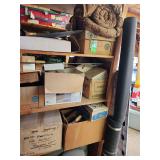 Contents of shelf. Luggage, speaker fan motor