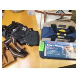 Variety of tool bags and a purse full of tools