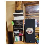 Yorxdual cassette player/recorder with speakers, cassette tapes and contents of shelf