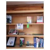 Contents of three shelves books miscellaneous items