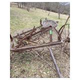 Antique horse-drawn dump rake, a type of vintage farm equipment