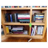 Bottom two rows of shelves books