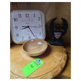 Wooden serving tray and bowl, Bulova quartz wall clock, and cast iron USA eagle bookend