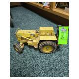 Vintage Ertl Ford 7500 Backhoe Loader Tractor, a die-cast metal toy vehicle