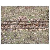 Antique agricultural drag harrow, also known as a spring-tooth harrow