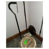 sewing basket , cane, carpet sweeper, and round glass