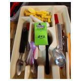 Kitchen utensils and cutting board
