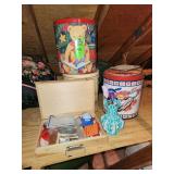 Large tins and cross stitching