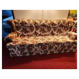vintage floral sofa commonly associated with early American or retro 1970s