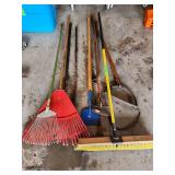 Yard tools rakes hose broom