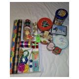 Wrapping paper, gift boxes, and holiday tins