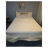 Queen size bed with boxspring and mattress