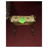 antique rocking footstool, also commonly referred to as a gout stool.