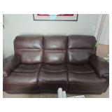 7' Leather John V. Schultz power reclining sofa.