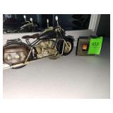 vintage-style motorcycle model is a handcrafted decorative item made of metal and small scenic picture