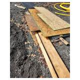 Miscellaneous wood two full sheets of 24/16 OSB plus partial peice also 2x10 and 2x4 and other pieces