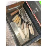 Contents of drawer, used masonry trowels