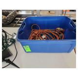 Extension cords spotlights in bins