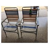 Two folding lawn chairs