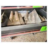 Contents of drawer, used masonry and tiling hand tools