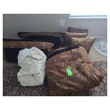 Complete king size bad set. Sheets for split king, pillow cases, shams, decorative pillows, and comforter