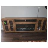 110" TV stand with working built in fire place. NO contents